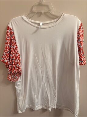 Acting Pro White Tee with Red Floral Ruffle Sleeves